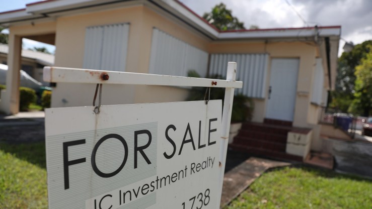 A for-sale sign is seen in front of a home on September 30, 2020 in Miami, Florida.