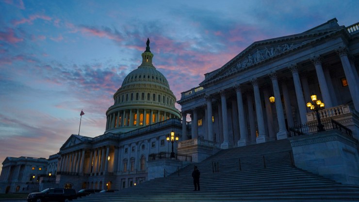 The U.S. Capitol is seen at sunset.