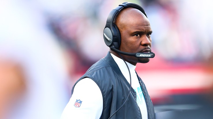Former head coach Brian Flores of the Miami Dolphins looks on during a game against the New England Patriots.