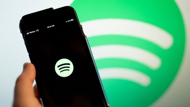 This illustration photo shows the Spotify logo on a smartphone.