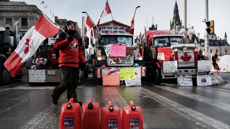 Hundreds of truck drivers and their supporters block the streets of downtown Ottawa as part of a convoy of protesters against COVID-19 mandates in Canada on February 09, 2022 in Ottawa, Ontario.