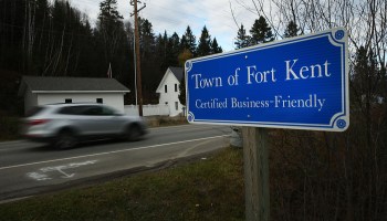A blue sign reads "Town of Fort Kent - Certified Business Friendly"