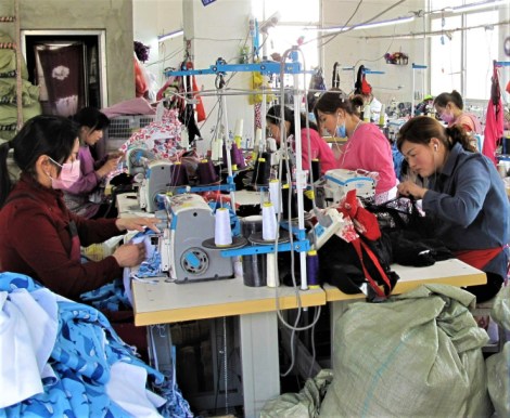 Seamstresses at a lingerie factory in Eastern China. Factory workers often work more than eight hours a day and usually for six days a week. (Charles Zhang/Marketplace) 