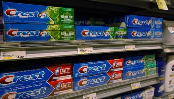Boxes of Crest toothpaste, with the American Dental Association's Seal of Acceptance, can be seen on a store shelf in Miami, Florida.
