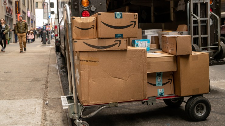 : A hand-truck with Amazon packages waits to be delivered on December 27, 2019
