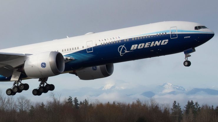 A Boeing airplane takes off.