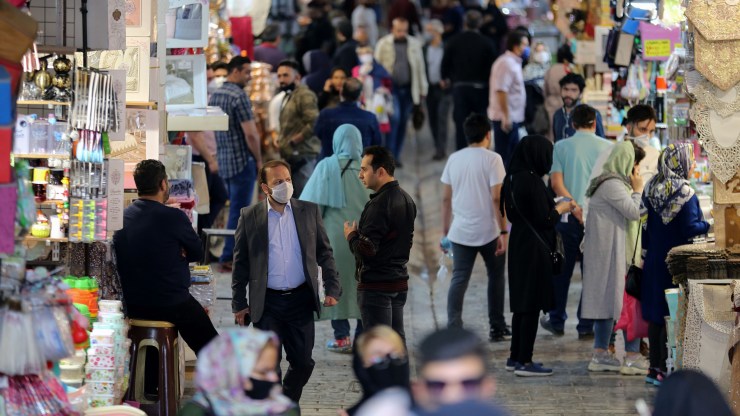 Iranians shop at the Grand Bazaar market in the capital Tehran on April 20, 2020, as the threat of the COVID-19 pandemic lingers ahead of the Muslim holy month of Ramadan.