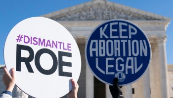 Pro-abortion and anti-abortion activists demonstrate at the Supreme Court.