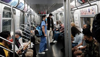 People in a subway car in New York.