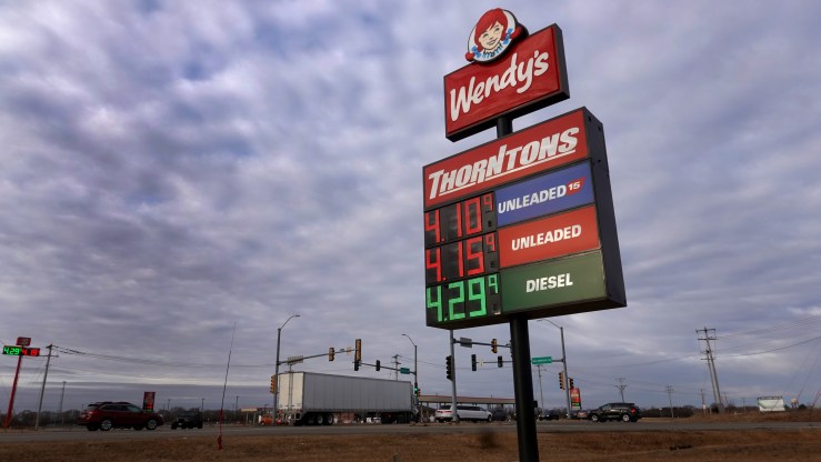 Fuel prices are displayed on a sign at a gas station on March 03, 2022 in Roscoe, Illinois.