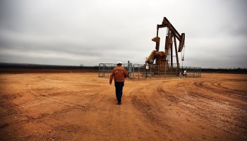 An oil well owned an operated by Apache Corporation in the Permian Basin are viewed on February 5, 2015 in Garden City, Texas.