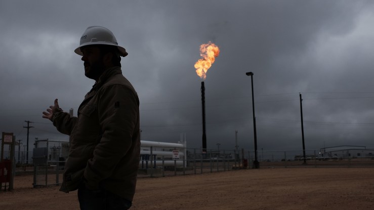 Natural gas being flared from Texas oil wells.