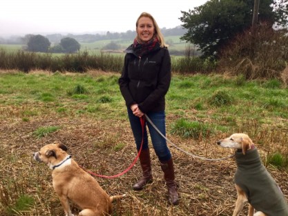 Julia Davies at a Dorset re-wilding project with her two dogs.