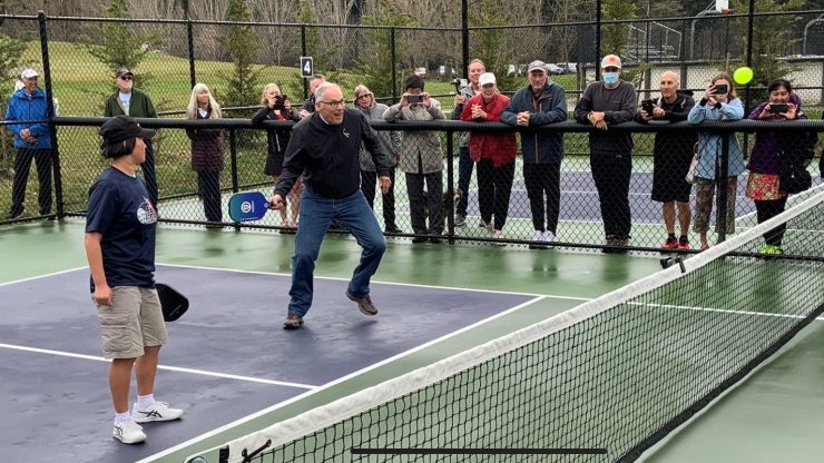 Washington Gov. Jay Inslee takes a turn on the pickleball court