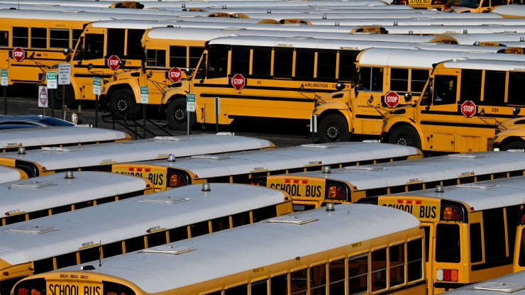 School buses are parked at the Arlington County Bus Depot, on January 26, 2022, in Arlington, Virginia.