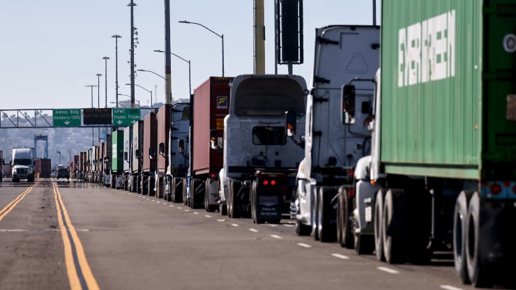 Trucks are lined up at the Port of Los Angeles on November 24, 2021, in San Pedro, California.