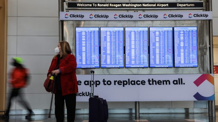 The departures and arrivals screen at the Washington National Airport.