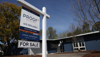 A for sale sign is posted in front of a home for sale on March 18, 2022 in San Rafael, California.