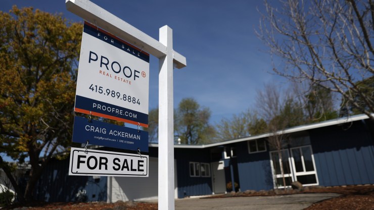 A for sale sign is posted in front of a home for sale on March 18, 2022 in San Rafael, California.