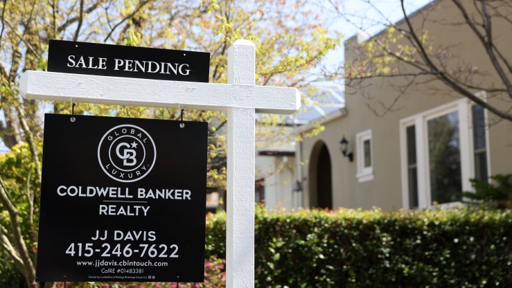 A sale pending sign is posted in front of a home for sale on March 18, 2022 in San Anselmo, California.