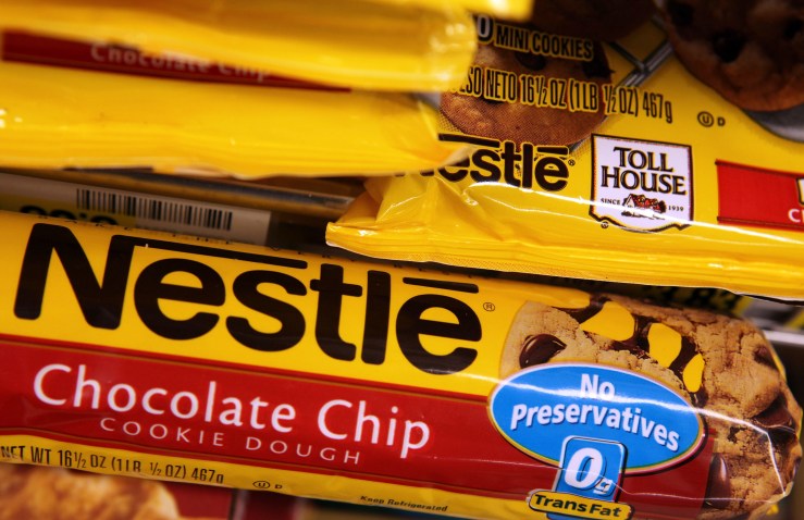 Chocolate chip cookie dough in yellow and red packaging, with the label "Nestle," is featured.