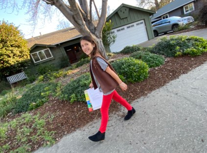 Nine-year-old Gianna Salcedo canvasses her neighborhood in Sacramento, California, to sell Girl Scout cookies.