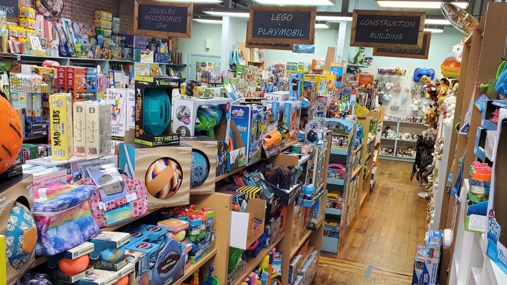 A shelf of outdoor toys at Ali Cat. "We had a great Easter," said owner Irene Kesselman. "And now we are starting to sell some of our pool toys and outdoor toys."
