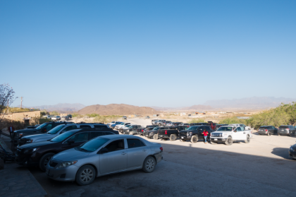 The full parking lot of the Starlight Theatre on a sunny, busy day