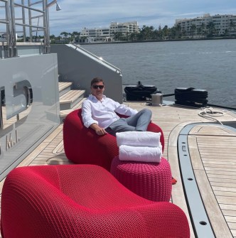 Sam Tucker is seen on a luxury yacht. 