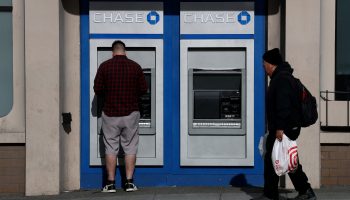A person using a Chase bank ATM.