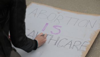 Pro-choice activists make signs in front of the U.S. Supreme Court on May 03, 2022 in Washington, DC.