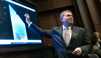 Deputy Director of Naval Intelligence Scott Bray explains a video of an unidentified aerial phenomena during his testimony before the House intelligence subcommittee hearing May 17 in Washington, D.C.