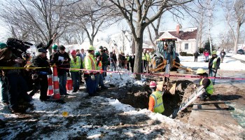 City of Flint, Michigan workers prepare to replace a lead water service line pipe at the site of the first Flint home with high lead levels to have its lead service line replaced under the Mayor's Fast Start program, on March 4, 2016 in Flint, Michigan.