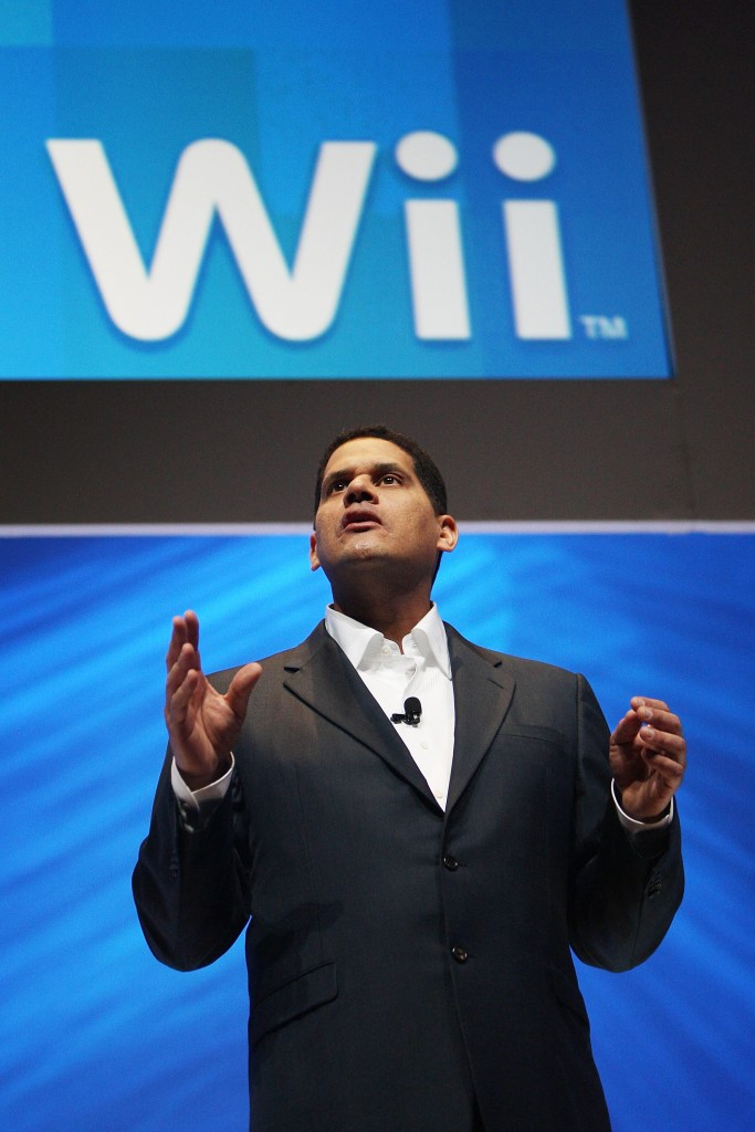 Reggie Fils-Aime, former Nintendo of America president, presents the Nintendo DSi system at the Nintendo media briefing on opening day of the 2009 E3 Expo