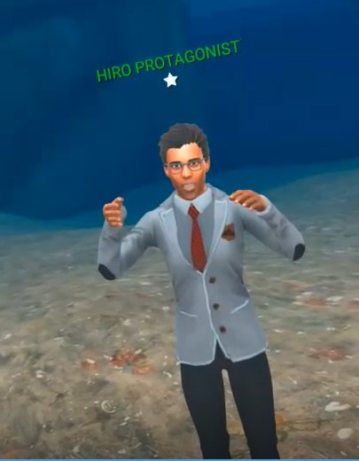 The virtual avatar for Rabindra Ratan, stands on the ocean floor in a suit.  Sand recedes into the distance behind him and above him is a white star, with green text that reads 