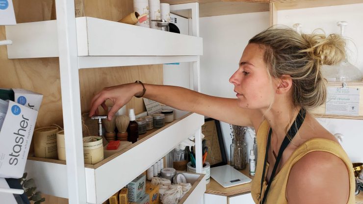 Samantha Keough browses a shelf lined with plastic-free products.