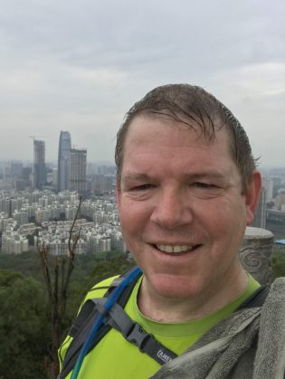 American Benjamin Schwall hiking in southern China's Dongguan, where he has an office. (Courtesy Benjamin Schwall)