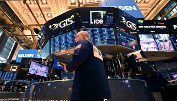 A trader is seen on the floor of the New York Stock Exchange.