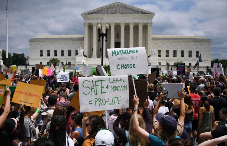 Abortion-rights activists demonstrate in front of the U.S. Supreme Court on Friday after the court's ruling was announced.