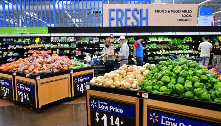 People shop for produce at a Walmart in California.