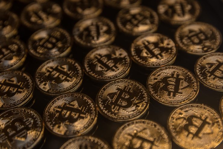 Gold Bitcoins are seen in the window of a Bitcoin and cryptocurrency exchange office on October 19, 2021 in Istanbul, Turkey. The number of Bitcoin and cryptocurrency exchanges have increased across Istanbul as cryptocurrency investing continues to boom in Turkey. Many investors see cryptocurrency's growth as a shelter against inflation and the depreciating Lira. Turkey's Lira has lost 20% of it's value this year as Bitcoin approaches it's all time high on the back of today's historic debut of the first Bitcoin futures ETF on the NYSE. (Photo by Chris McGrath/Getty Images)