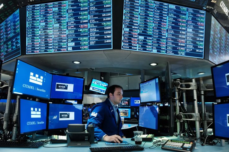 Traders work on the floor of the New York Stock Exchange (NYSE) on June 14, 2022 in New York City.
