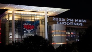 As this year's NRA convention was underway in Houston, Texas, image of the number of mass shootings throughout 2022 was projected on the convention building.