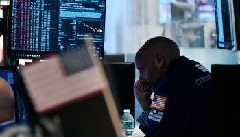 A trader working on the floor of the New York Stock Exchange.