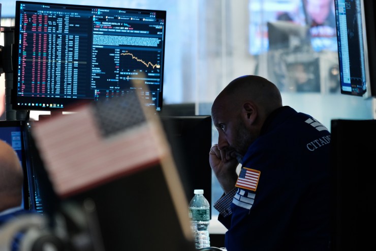 A trader working on the floor of the New York Stock Exchange.