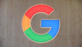 The Google logo, a multicolored capital G.