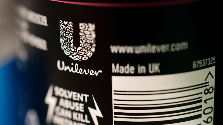 A Unilever logo on a bottle of the company's Sure deodorant.