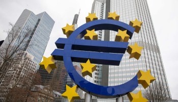 The Euro currency sign is seen in front of the former European Central Bank (ECB) building in Frankfurt.