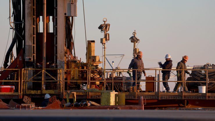 Workers on an oil drilling rig in Texas