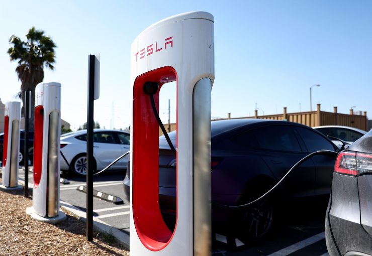 Tesla cars recharge at a Tesla Supercharger station on April 14, 2022 in Pasadena, California.